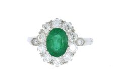Diamond & Gold Jewellery Oval Emerald and Diamond Cluster Platinum Ring