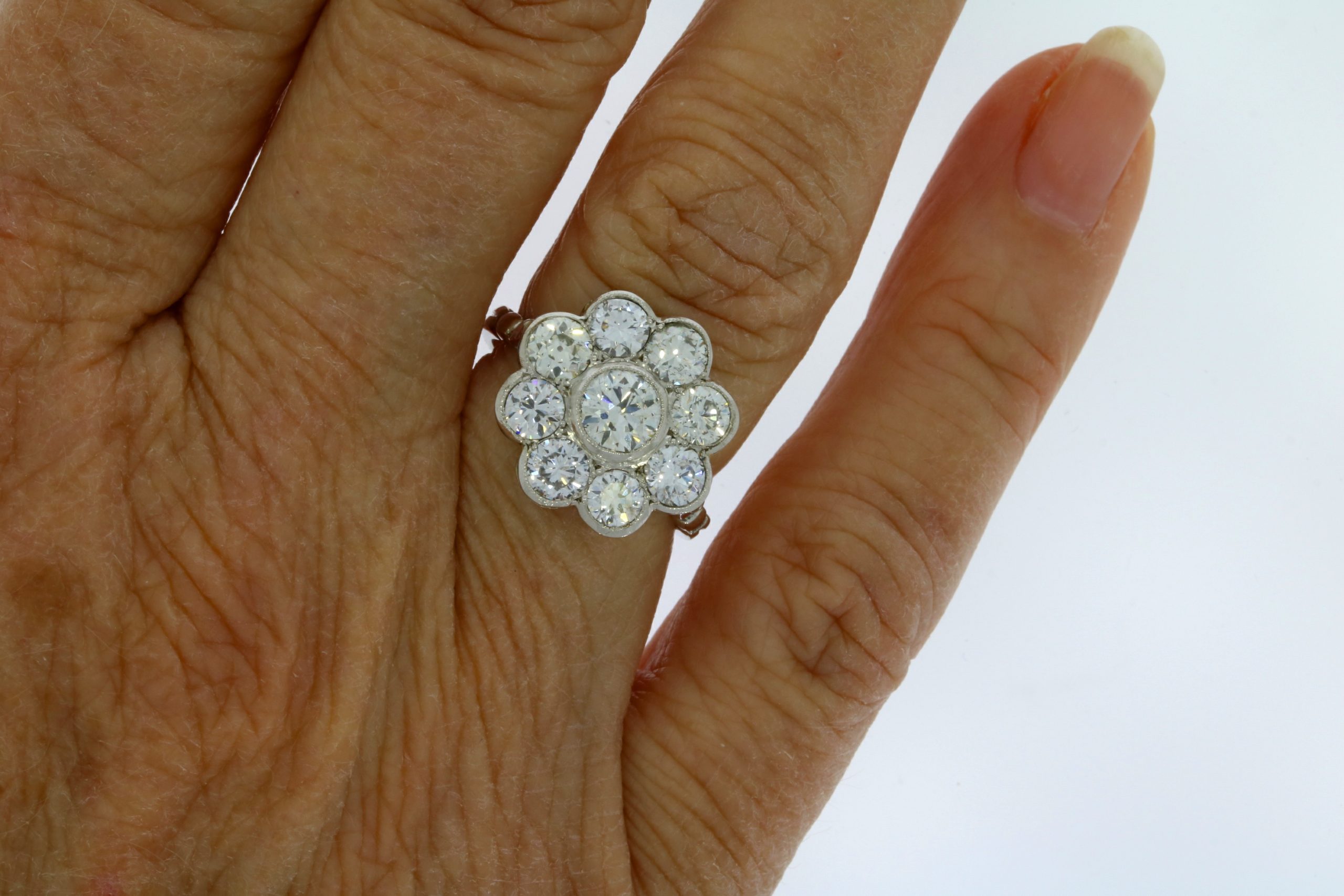 Diamond & Gold Jewellery 2cts 35pts Nine Stone Diamond Daisy Ring set in Platinum